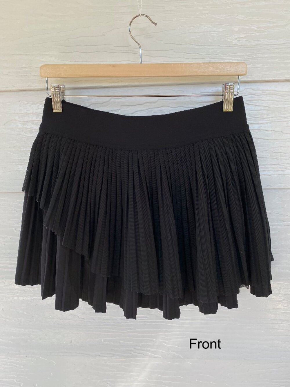 Black pleated Lululemon skirt with attached shorts, size M